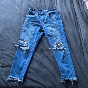 American Eagle blue jeans with knee rips